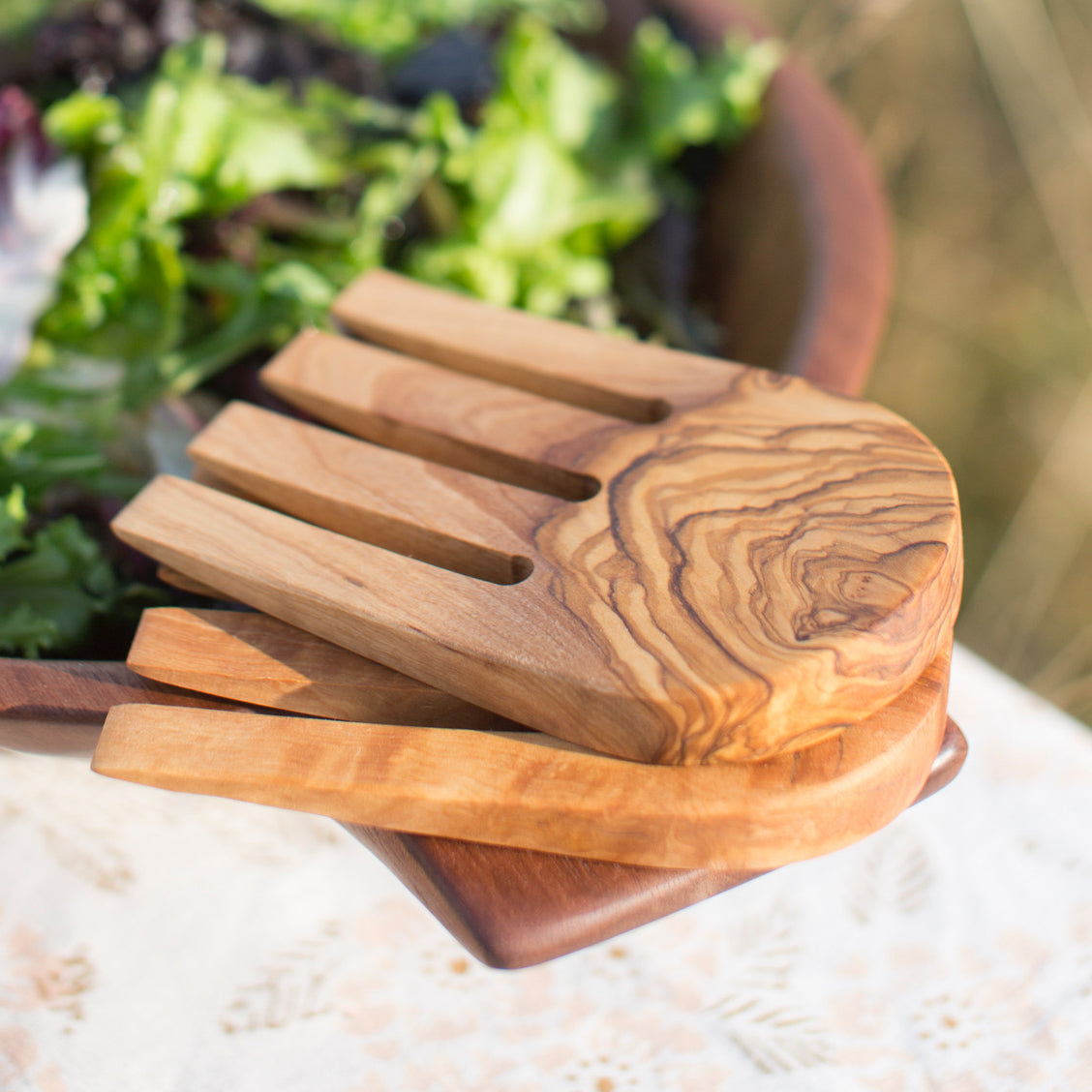 Smooth handcrafted olive wood salad hands