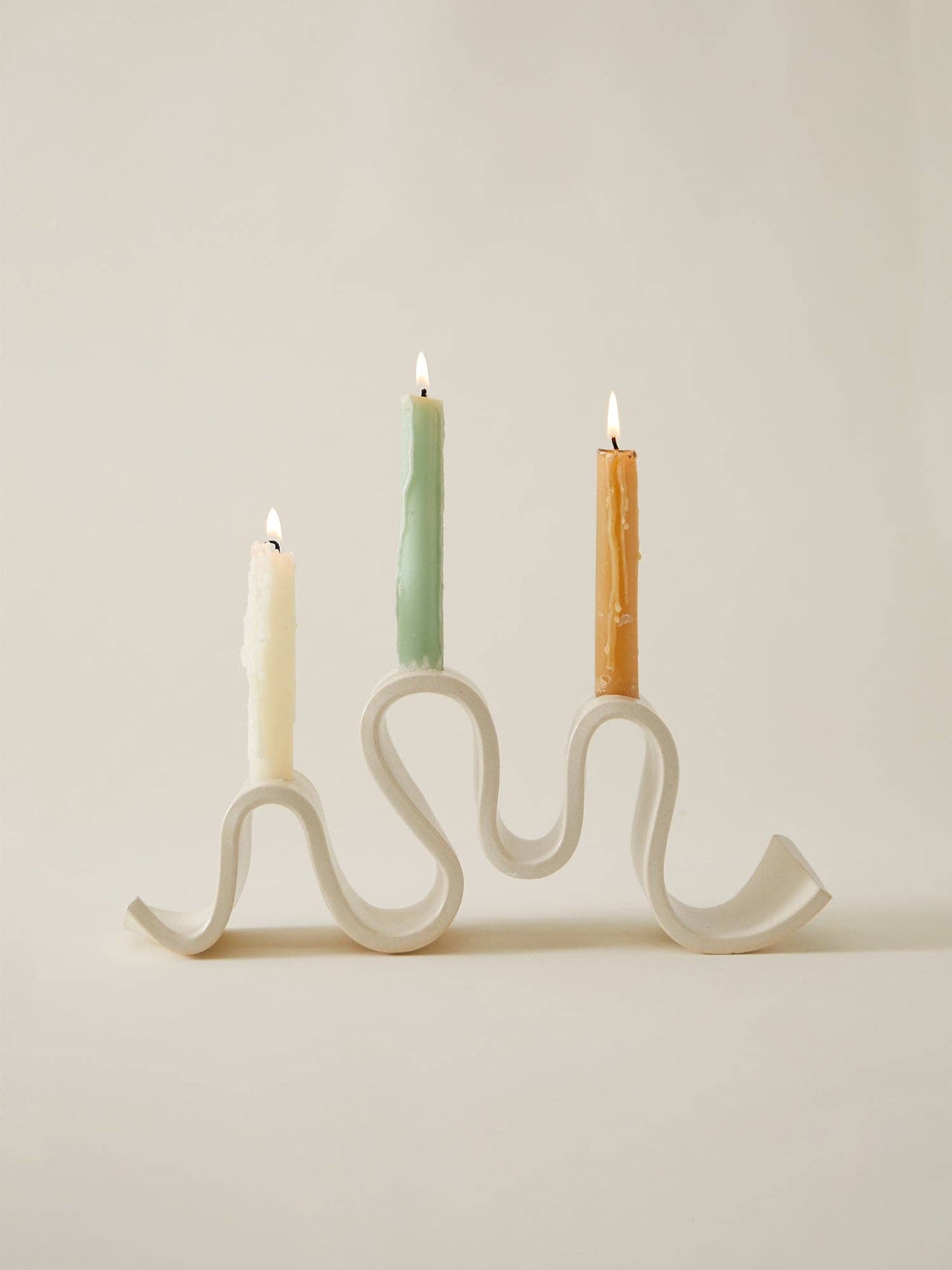 Ceramic stoneware candelabra with indulgent waves in cream